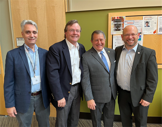 Rep. Morelle stands with leaders from RIT and NTID