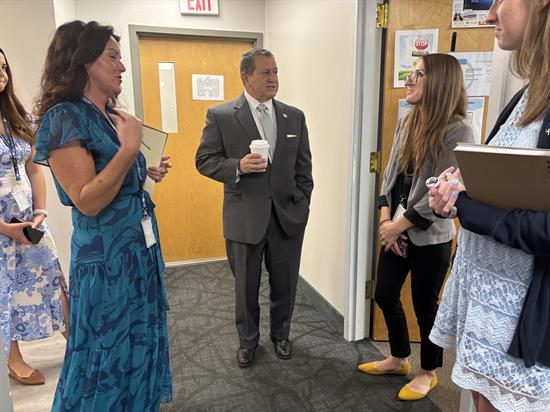 Congressman Morelle speaks with staff at Oak Orchard health.