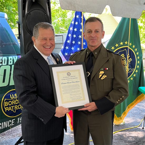 Rep. Morelle presents a Certificate of Congressional Recognition to the Rochester Border Patrol