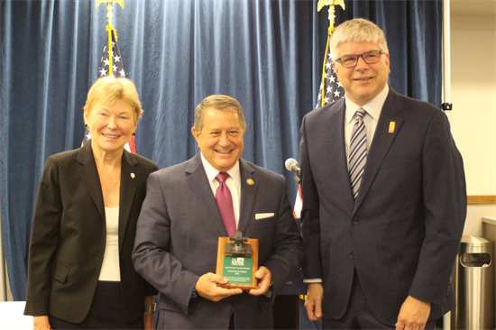 A photo of Rep. Morelle holding an award he received