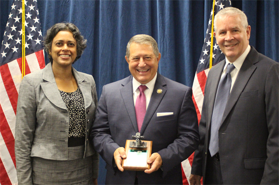 A photo of Rep. Morelle holding an award he received