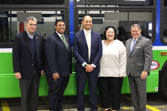 Congressman Morelle stands with RTS leadership in front of a hydrogen fuel cell bus