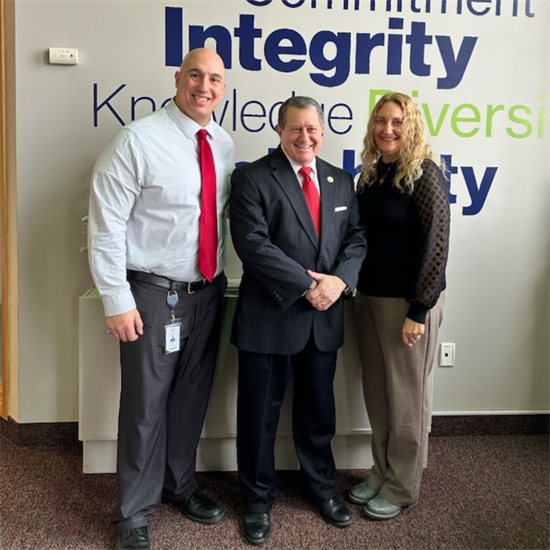 Congressman Morelle stands with leaders from the Rochester Child Care council