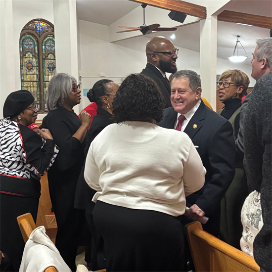 Congressman Morelle stands with the congregation at the Memorial A.M.E. Zion New Pastor Welcome Event