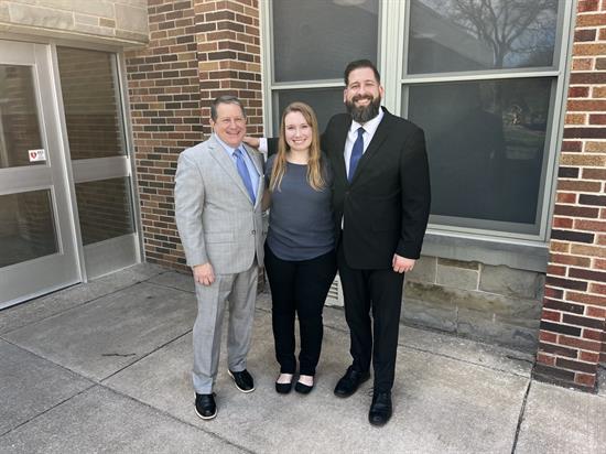 Congressman Morelle stands with staff at the Rochester School for the Deaf.