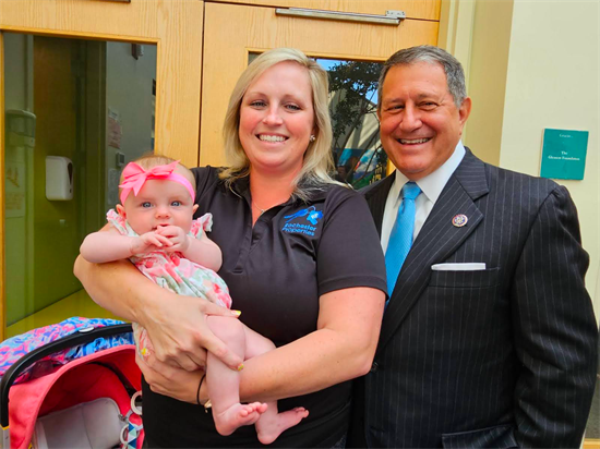 Rep. Morelle stands with a local family at a press conference on childcare