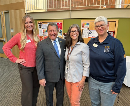 Rep. Morelle stands with leaders from RIT and NTID