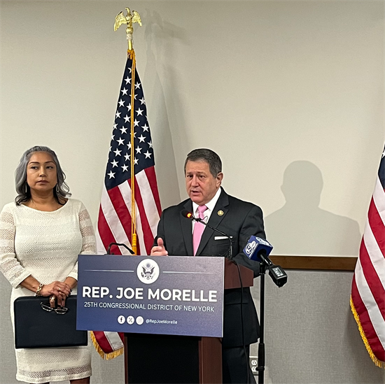 Congressman Morelle stands with Jackie Ortiz at a press conference