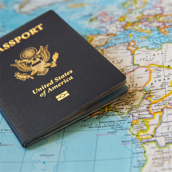 Photo of U.S. Passport on a world map.