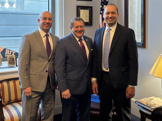 Congressman Morelle stands with the CEO of RTS