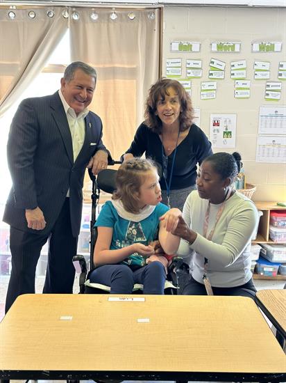 Congressman Morelle poses with patients at Marie Cariola Center