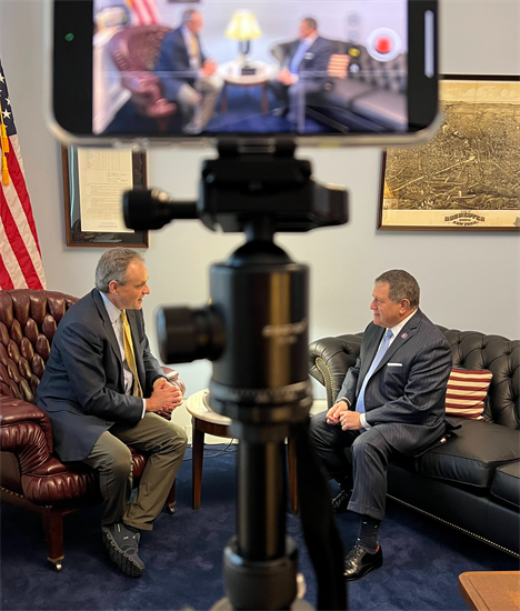 A behind the scenes photo of Rep. Morelle and Simon Johnson's conversation