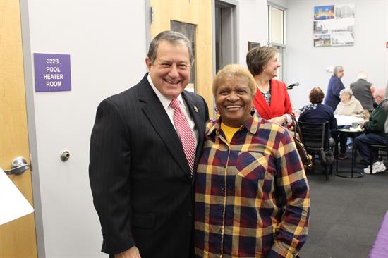 Congressman Morelle stands with a senior at the Lily Cafe