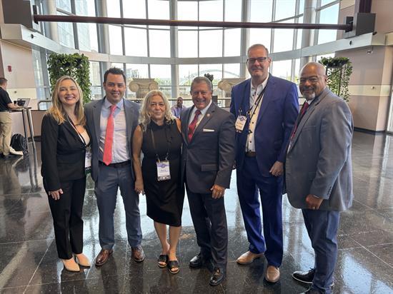 Congressman Morelle stands with leaders from the APEX Accellerator.