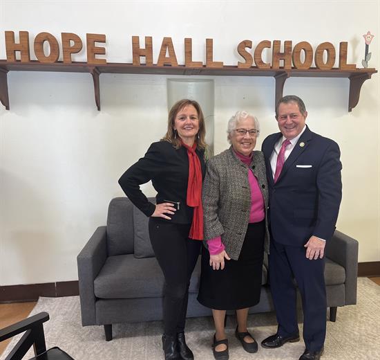 Congressman Morelle stands with leaders at Hope Hall School