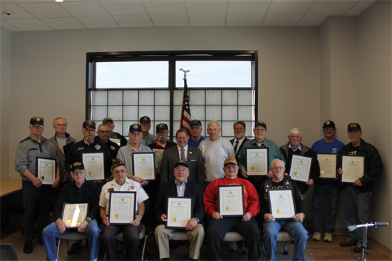 A group photo of Congressman Morelle and local Vietnam War Veterans