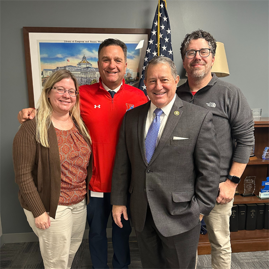 Congressman Morelle stands with members of the Fairport Central Schools Board of Education