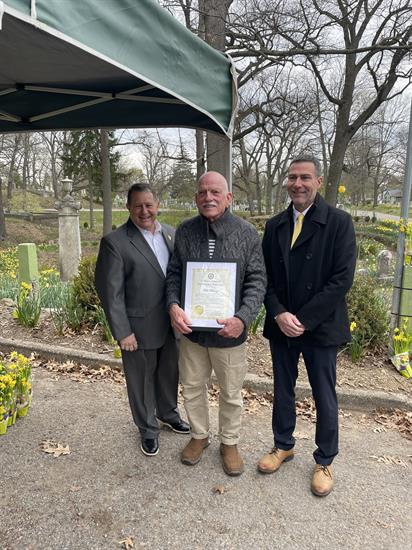 Congressman Morelle stands with Bill Whitney and the Daffodil Project to present a certificate of Congressional Recognition.