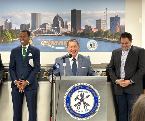 Rep. Morelle stands with Rochester leaders at a press conference at UNICON