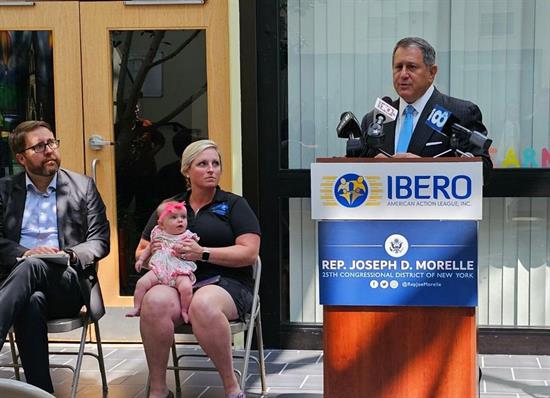 Congressman Morelle stands at a childcare press conference.