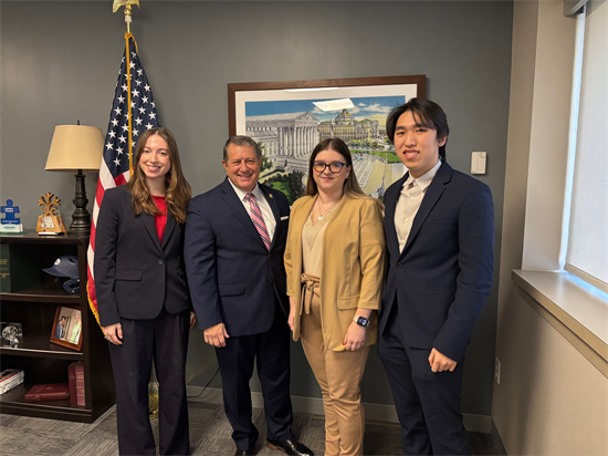 Congressman Morelle stands with the Rochester office interns.