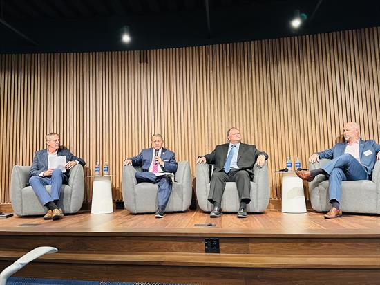 Congressman Morelle sits on a panel at a meeting about Rochester's Tech Hubs designation