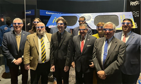 Rep. Morelle stands with local leaders in eclipse glasses at the Rochester Museum and Science Center