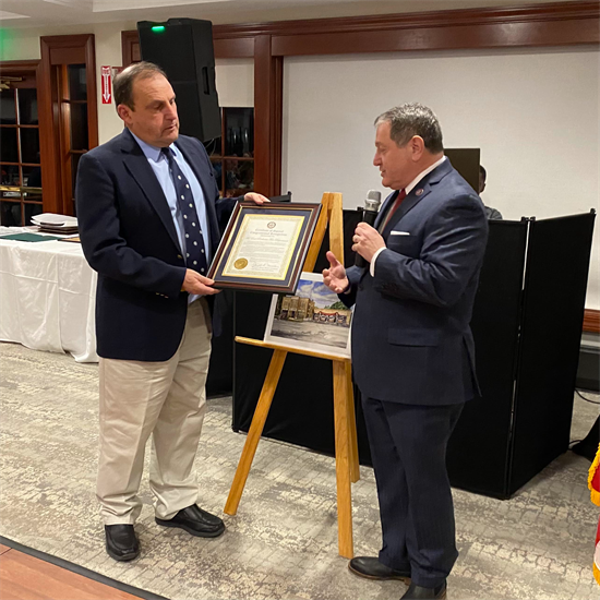 Rep. Morelle presents a certificate to the East Rochester Fire Department